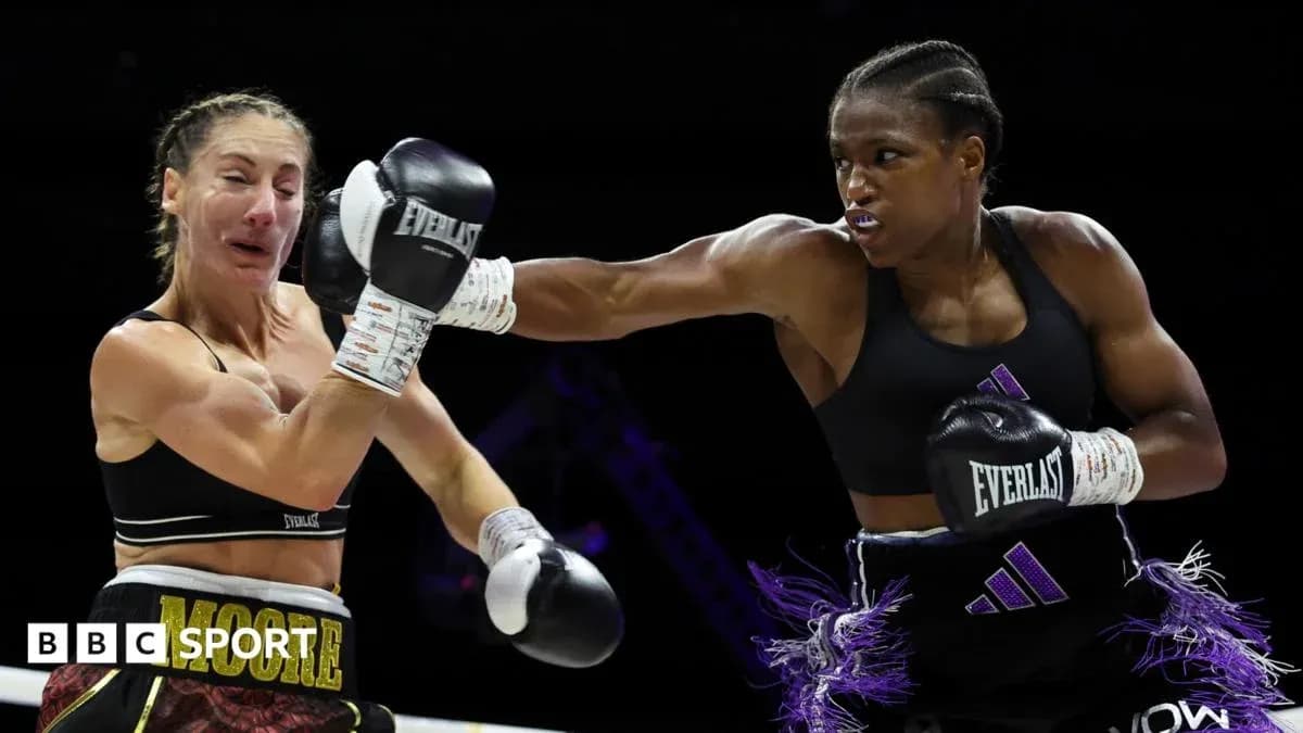 Boxer delivering a punch during match action