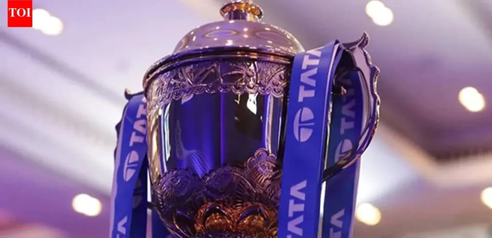 Close-up of trophy with blue ribbons displayed