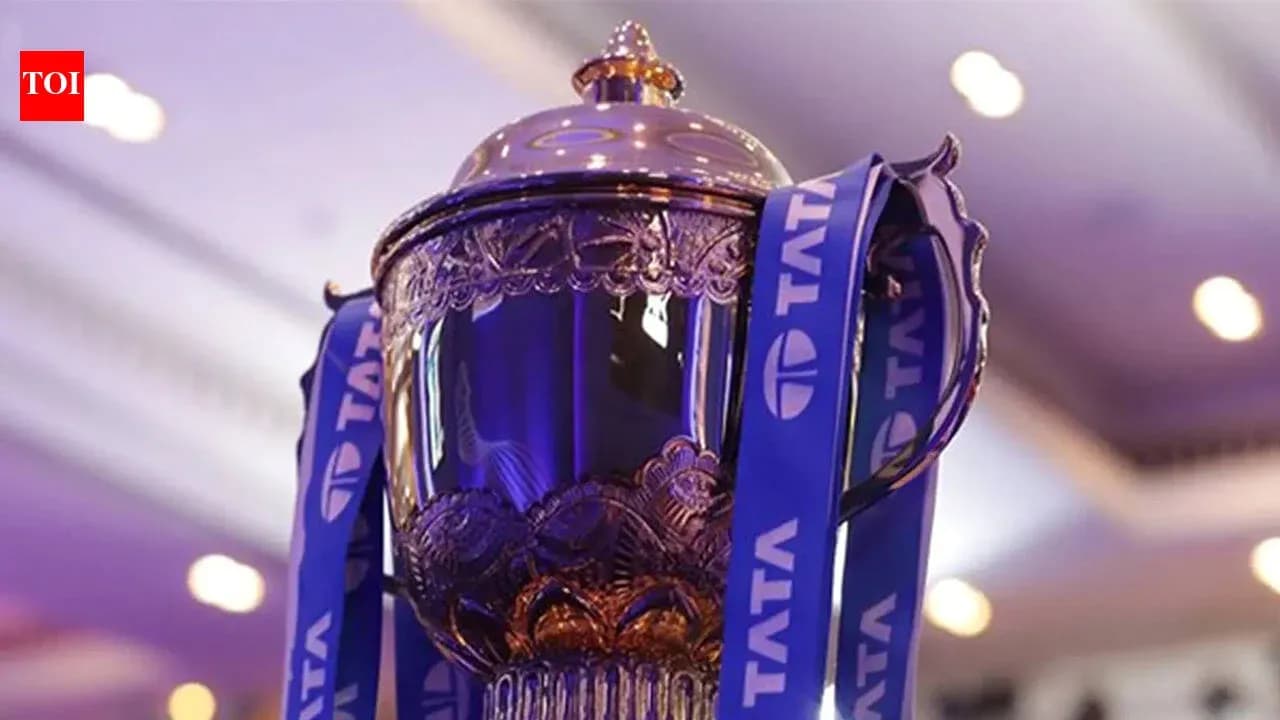 Close-up of trophy with blue ribbons displayed