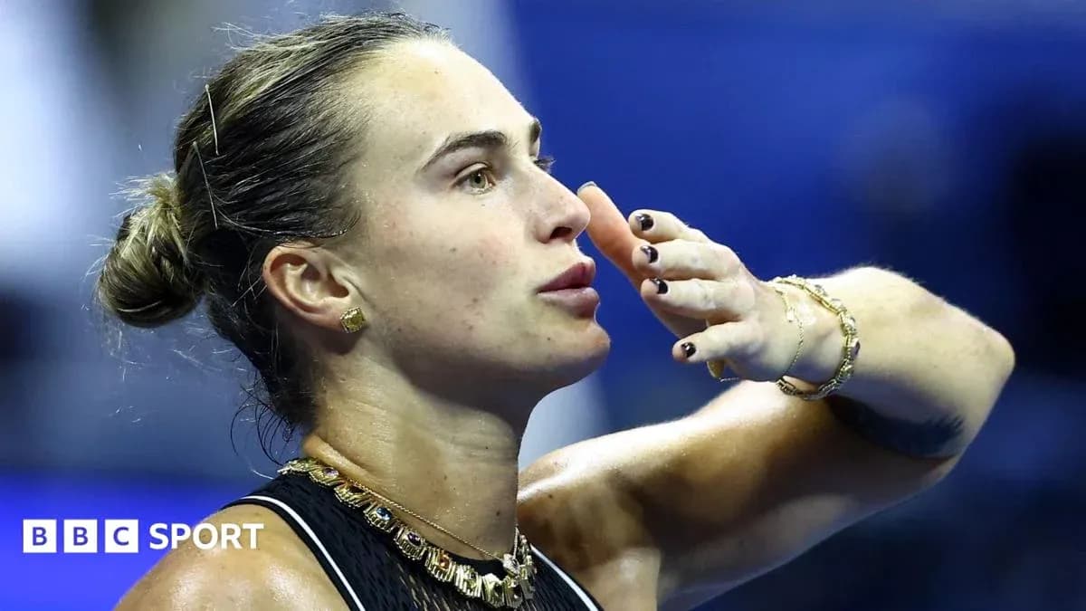 Tennis player blowing a kiss after match