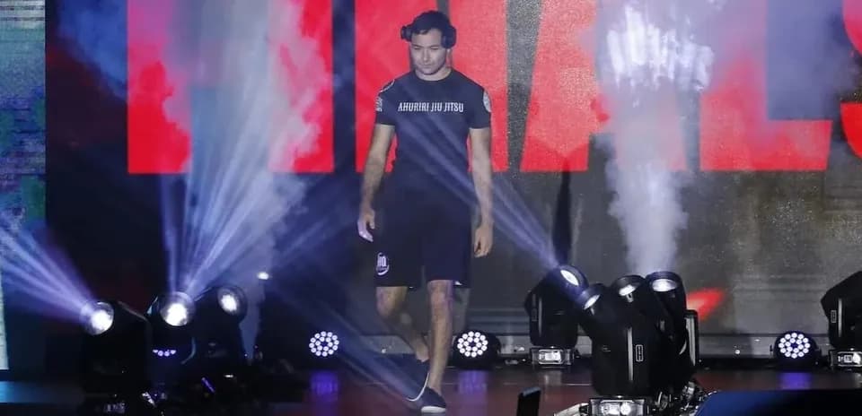 Athlete entering arena during finals entrance ceremony