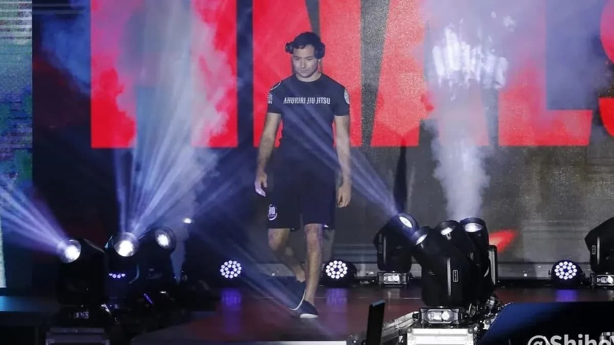 Athlete entering arena during finals entrance ceremony