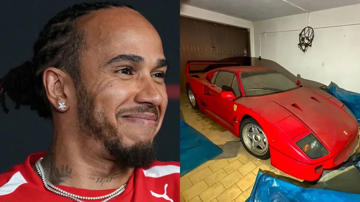 Close-up of a man smiling beside a covered Ferrari