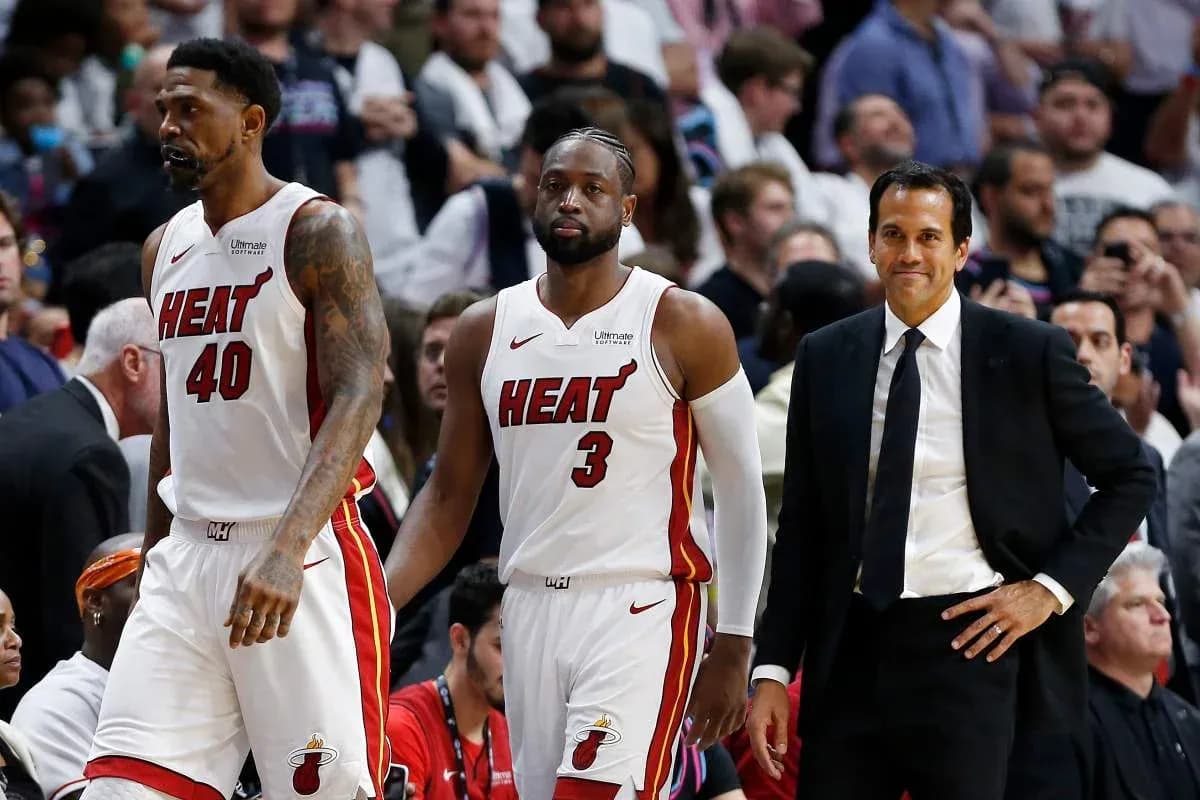 Miami Heat players and coach during game moment