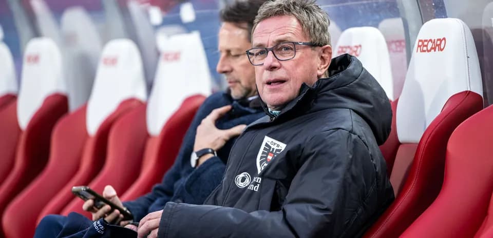 Coach sitting on the bench during a match