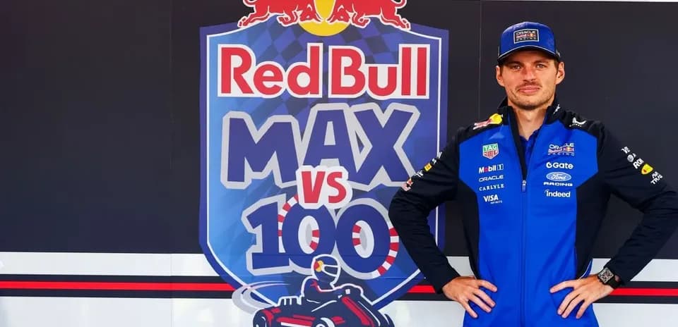 Driver posing in front of Red Bull event backdrop