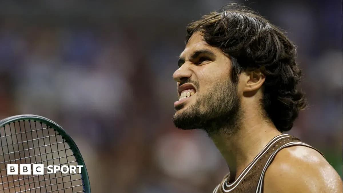 Tennis player reacting during a match on court