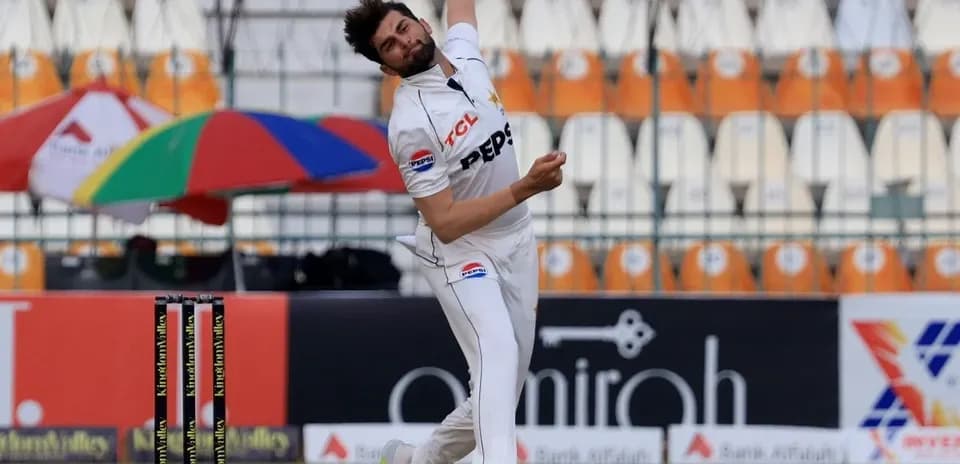 Bowler delivering a ball during a cricket match