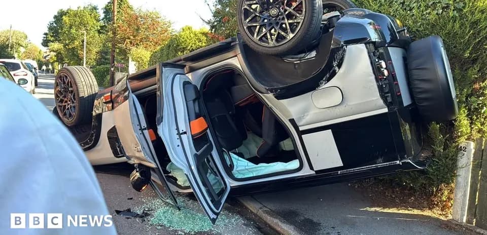 Upside-down sports car on the roadside