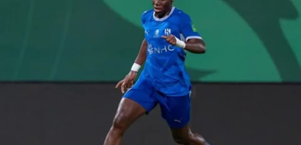 Player dribbling the ball during a soccer match