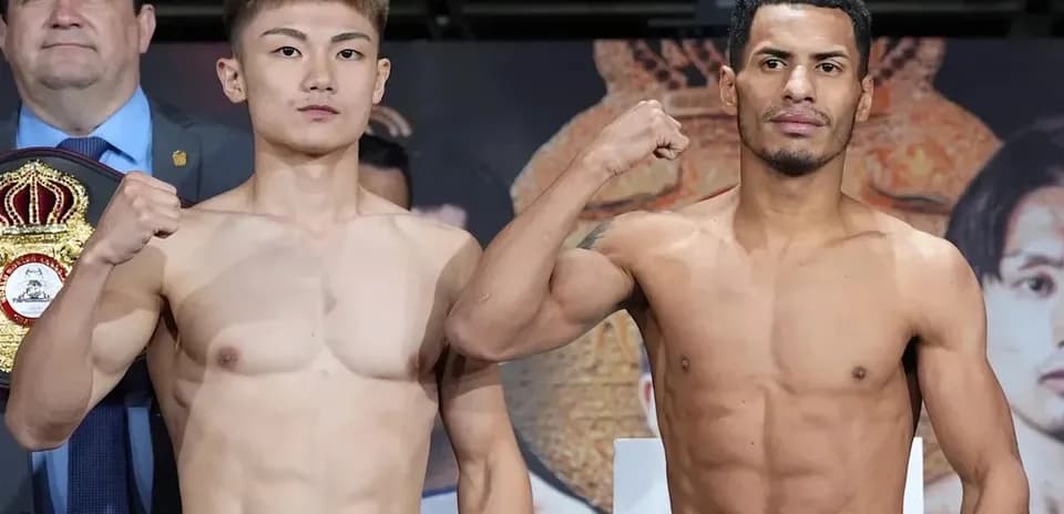 Two boxers posing for weigh-in before match