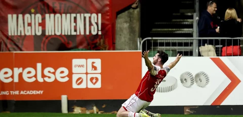 Player celebrating after scoring a goal during match