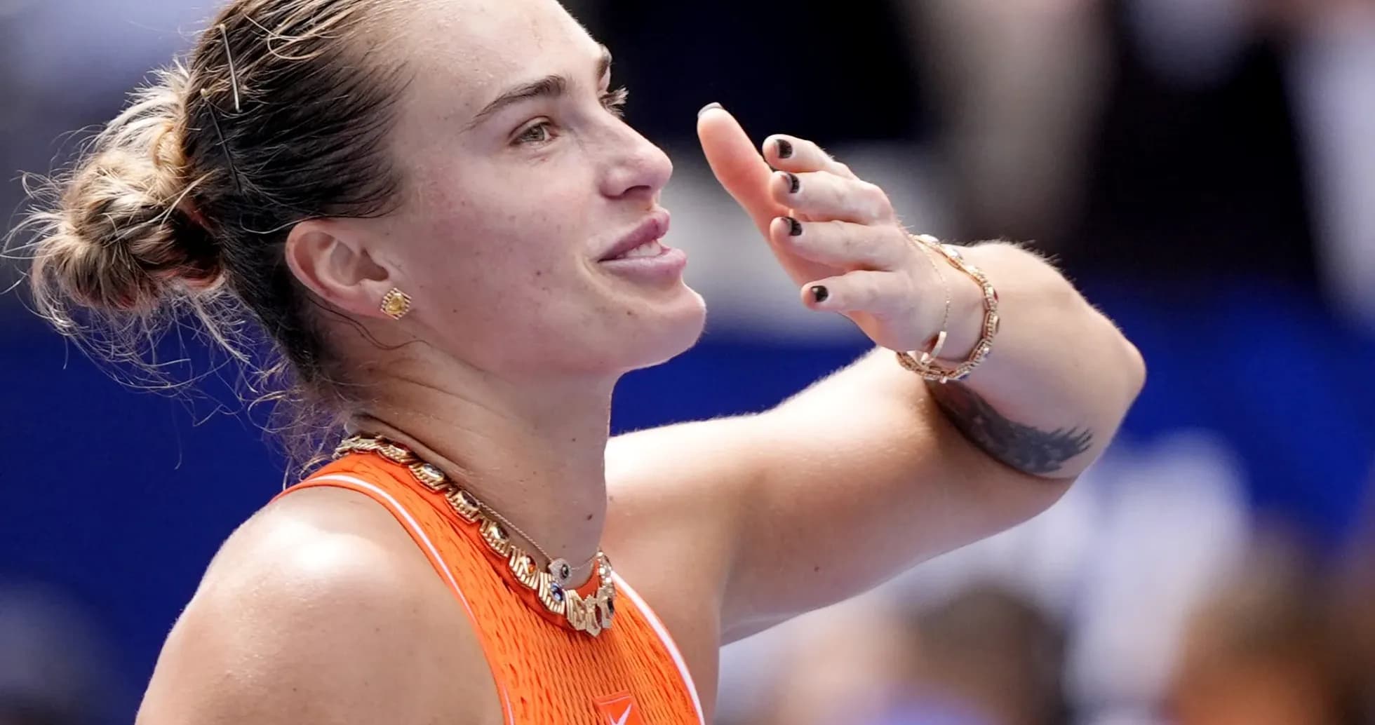 Tennis player celebrating after match victory
