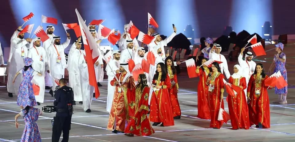 Bahrain team parading with flags at opening ceremony