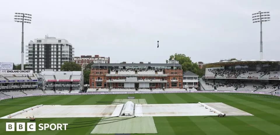 Rain covers on cricket pitch at Lord's Stadium