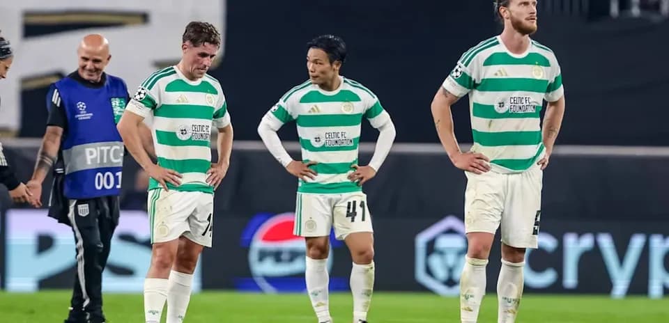 Celtic players walking off the pitch after match