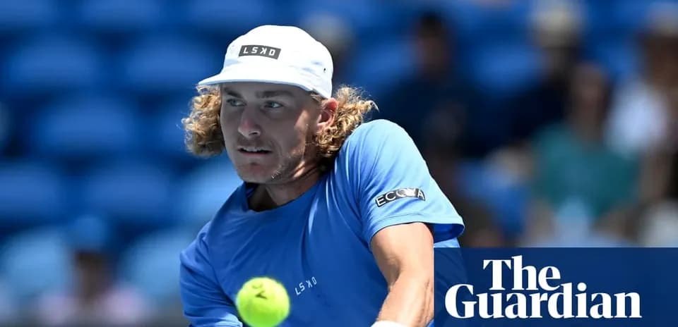 Tennis player preparing to hit a tennis ball