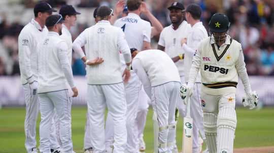 Pakistani batsman dismissed, England team celebrates wicket