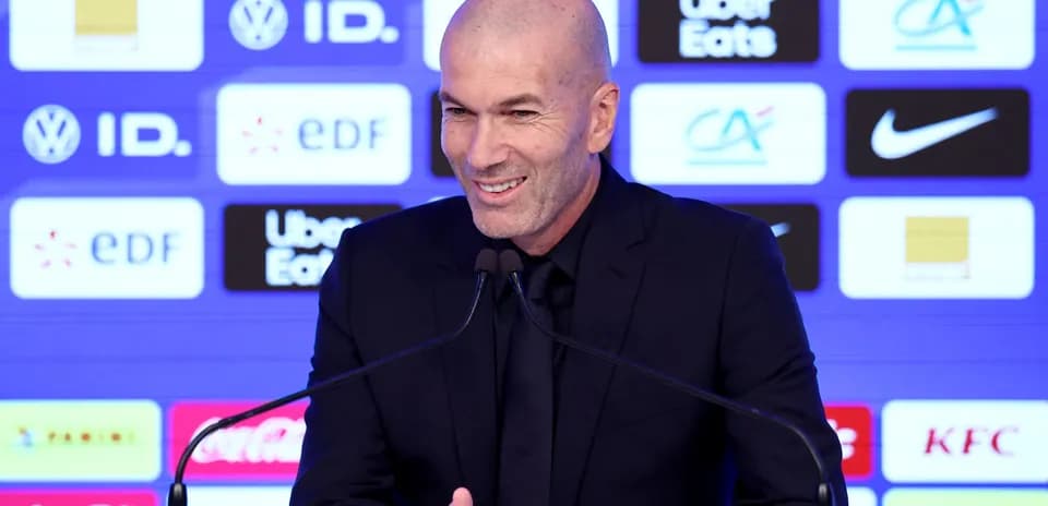 Manager speaking at press conference podium