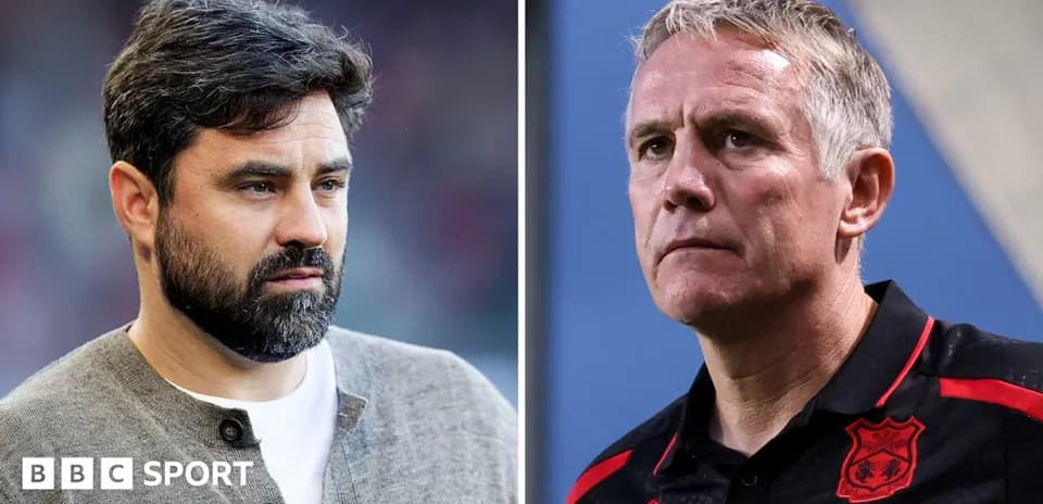Two football managers during a match analysis