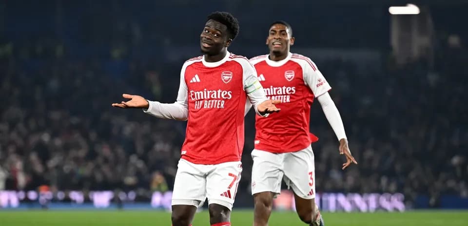 Arsenal players celebrating during match against Brighton