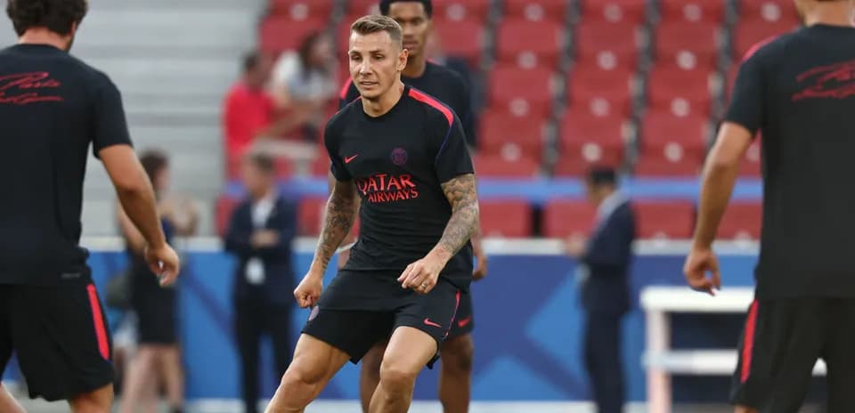 Player training on pitch during team practice session