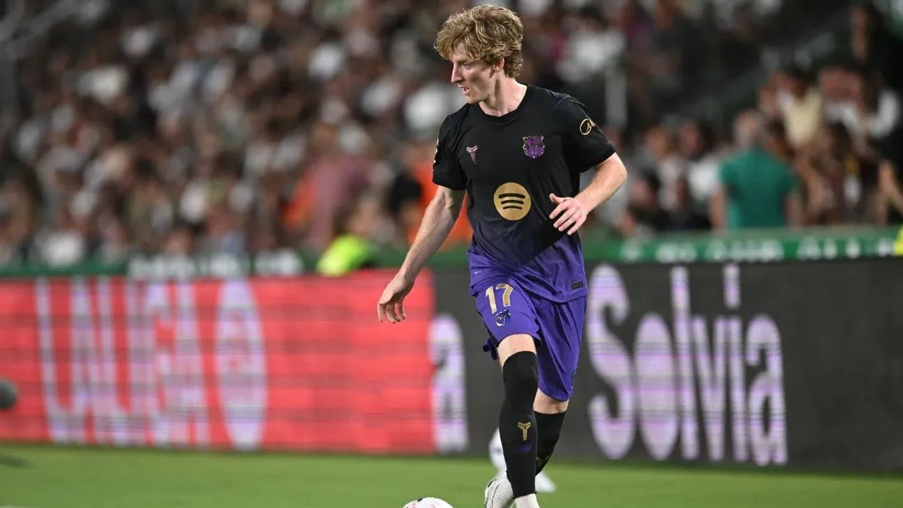 Player in Barcelona kit running with the ball