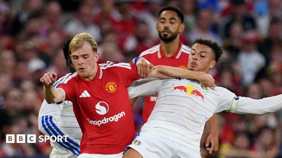 Players battling for possession during a football match Players battling for possession during a football match