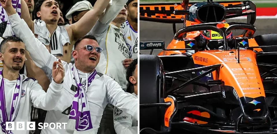 Fans cheering for team alongside McLaren F1 car