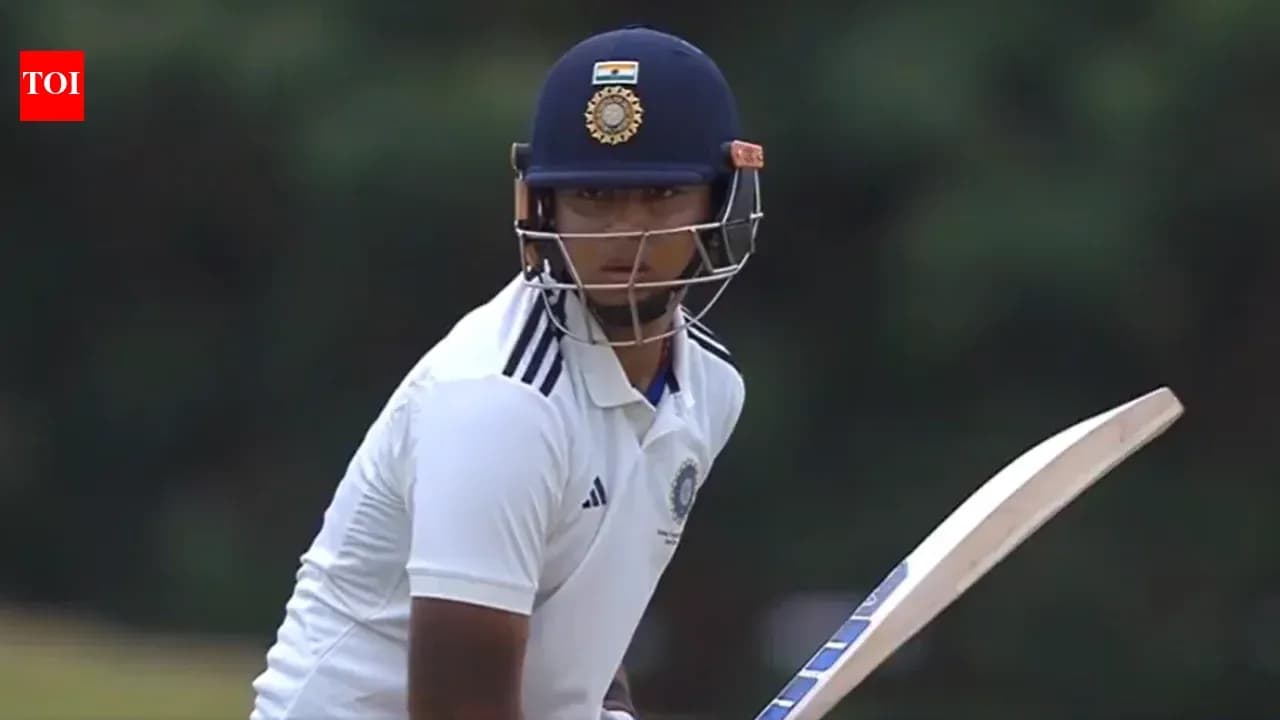 Batter preparing to face delivery on cricket field