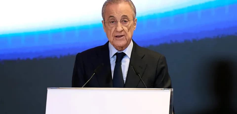 Executive speaking at a podium during event