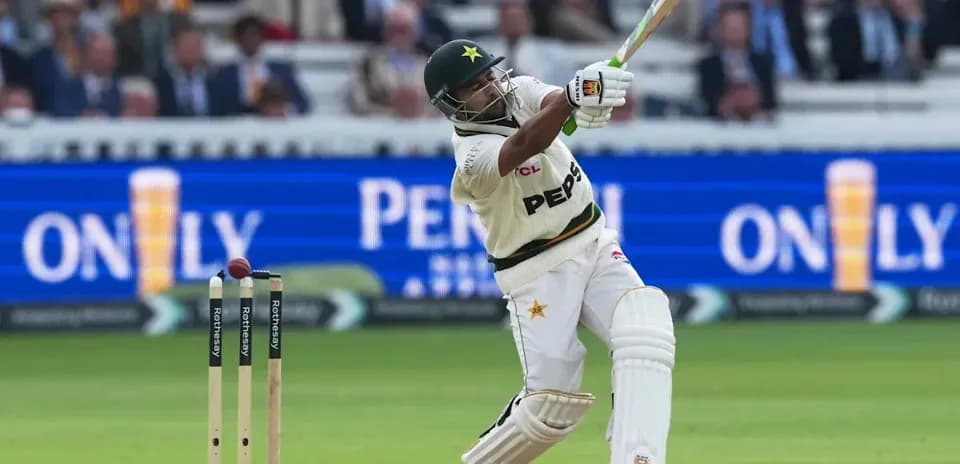 Batsman striking the ball during cricket match