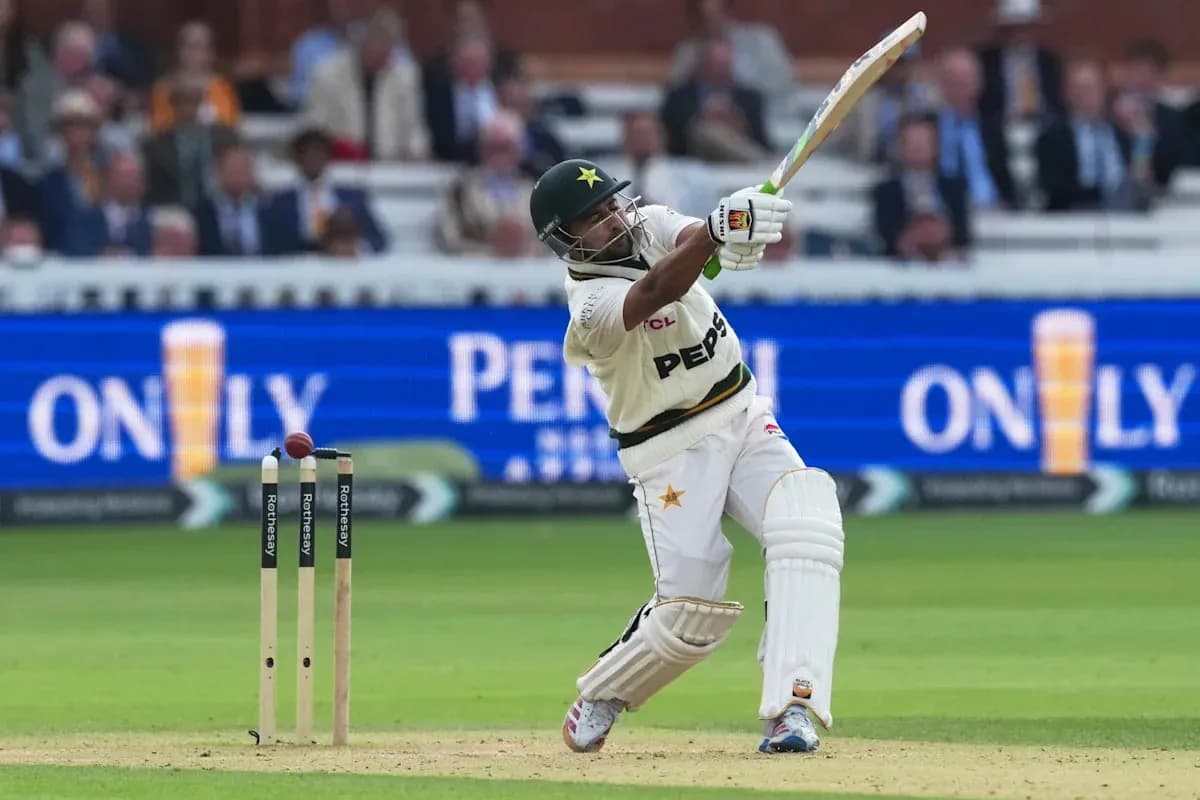 Batsman striking the ball during cricket match