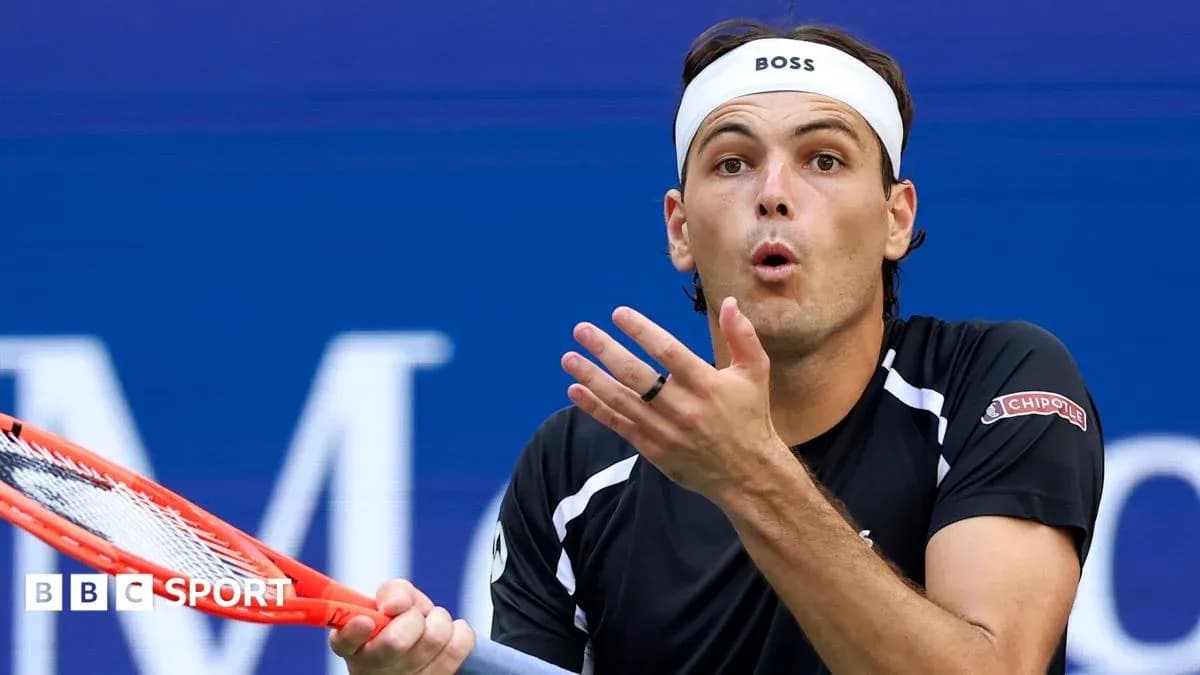 Tennis player reacting during a match on court