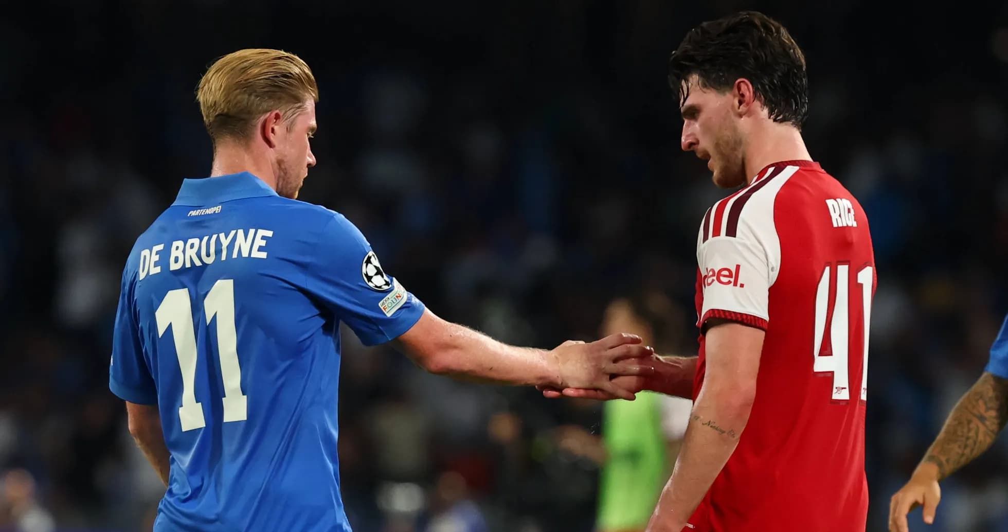 De Bruyne and Rice shaking hands on pitch