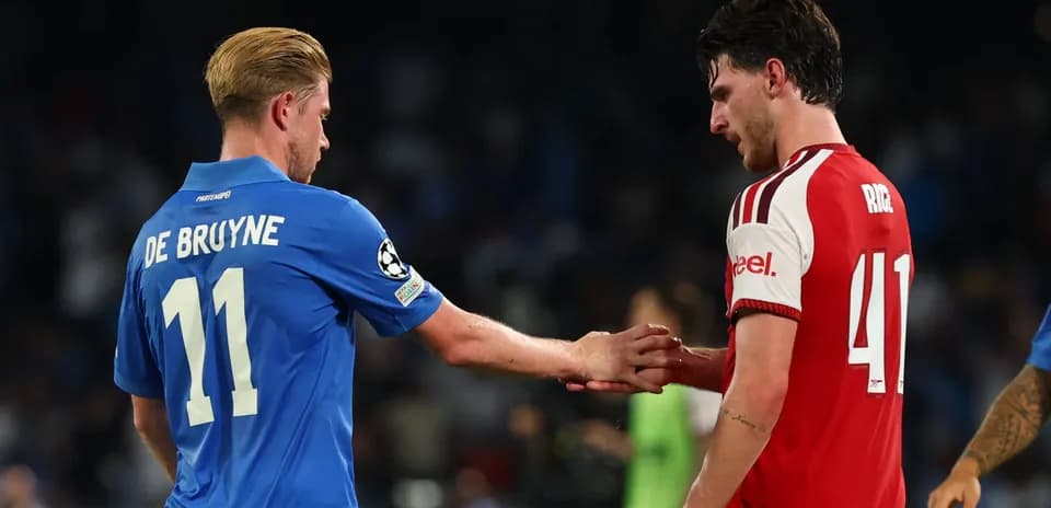 De Bruyne and Rice shaking hands on pitch