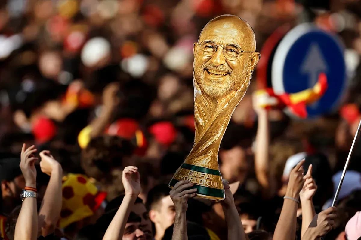 Fans celebrating with FIFA World Cup trophy outdoors