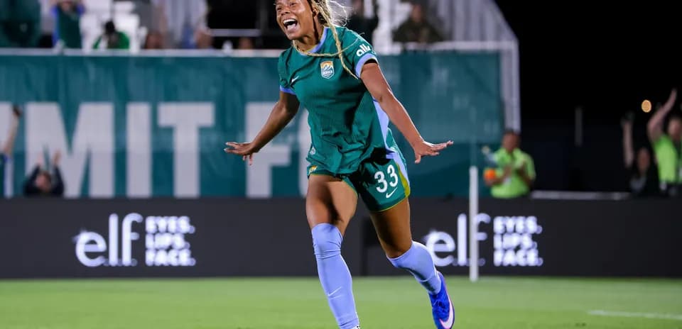 Player celebrating a goal on the field