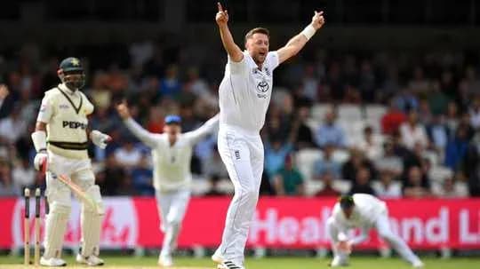 Bowler celebrating after taking a wicket in cricket match