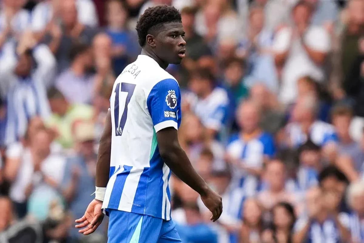 Player in blue and white kit during match