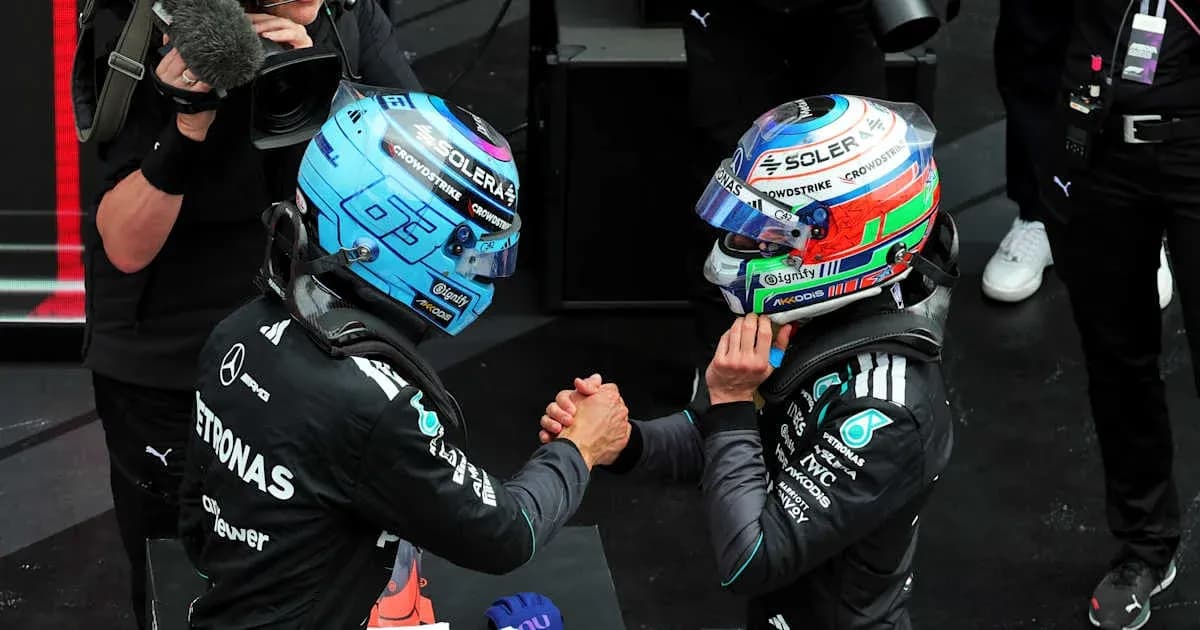 Two Formula 1 drivers shaking hands after race