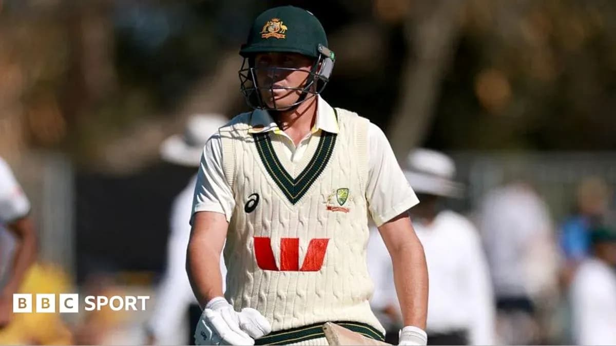 Cricketer wearing Australia kit walking on field Cricketer wearing Australia kit walking on field