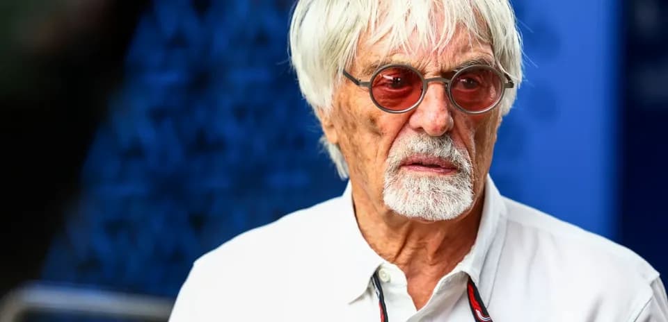 Older man with white hair and sunglasses