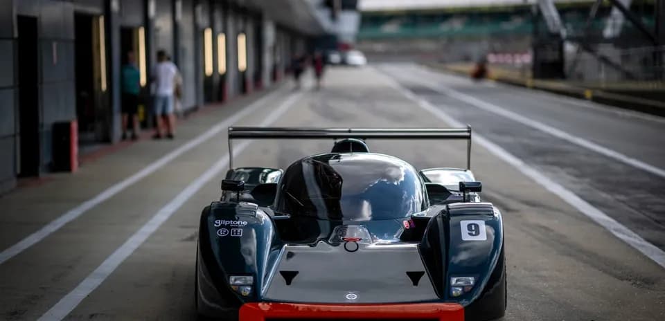 Race car in pit lane at racetrack