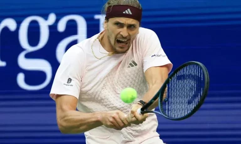 Player hitting a tennis ball during match