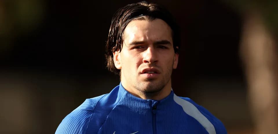 Player in blue training kit during training session