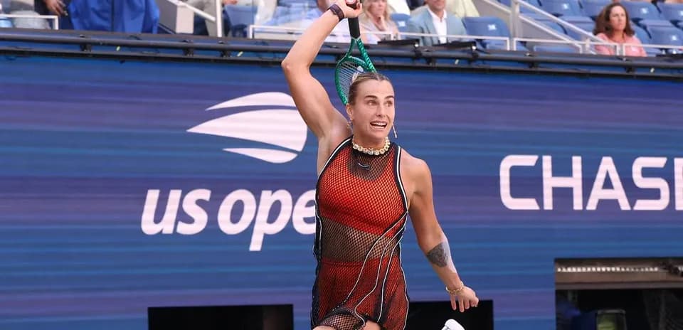 Player serving during US Open match