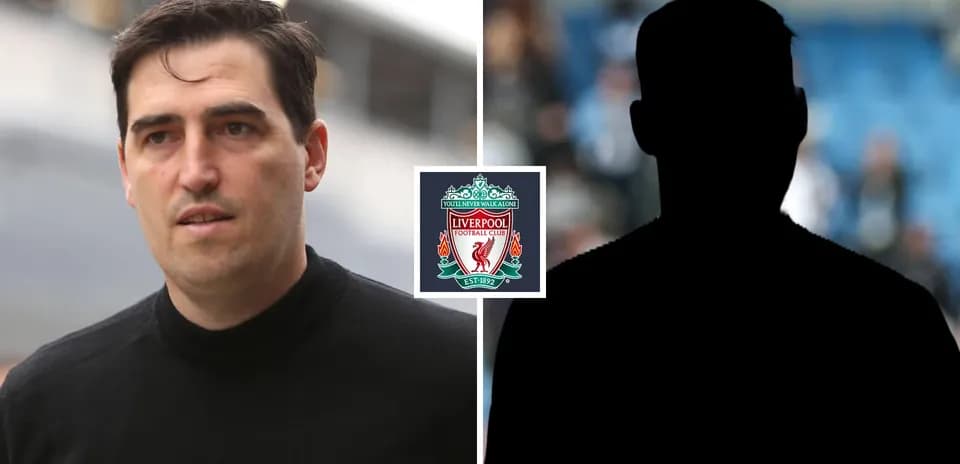 Person walking near Liverpool FC logo background