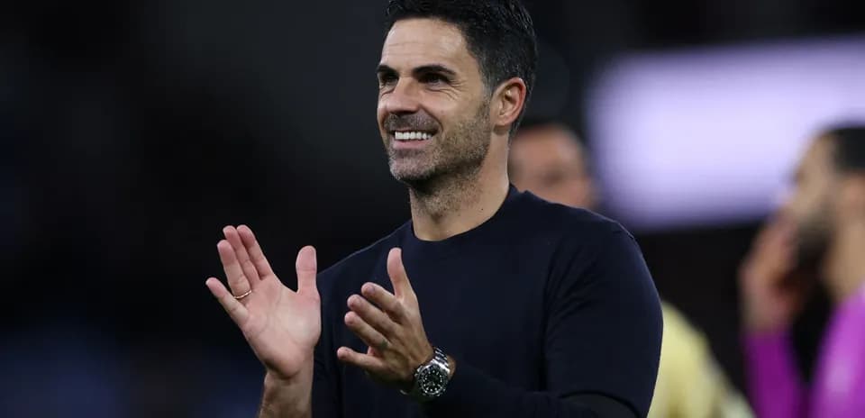 Coach clapping during a match celebration
