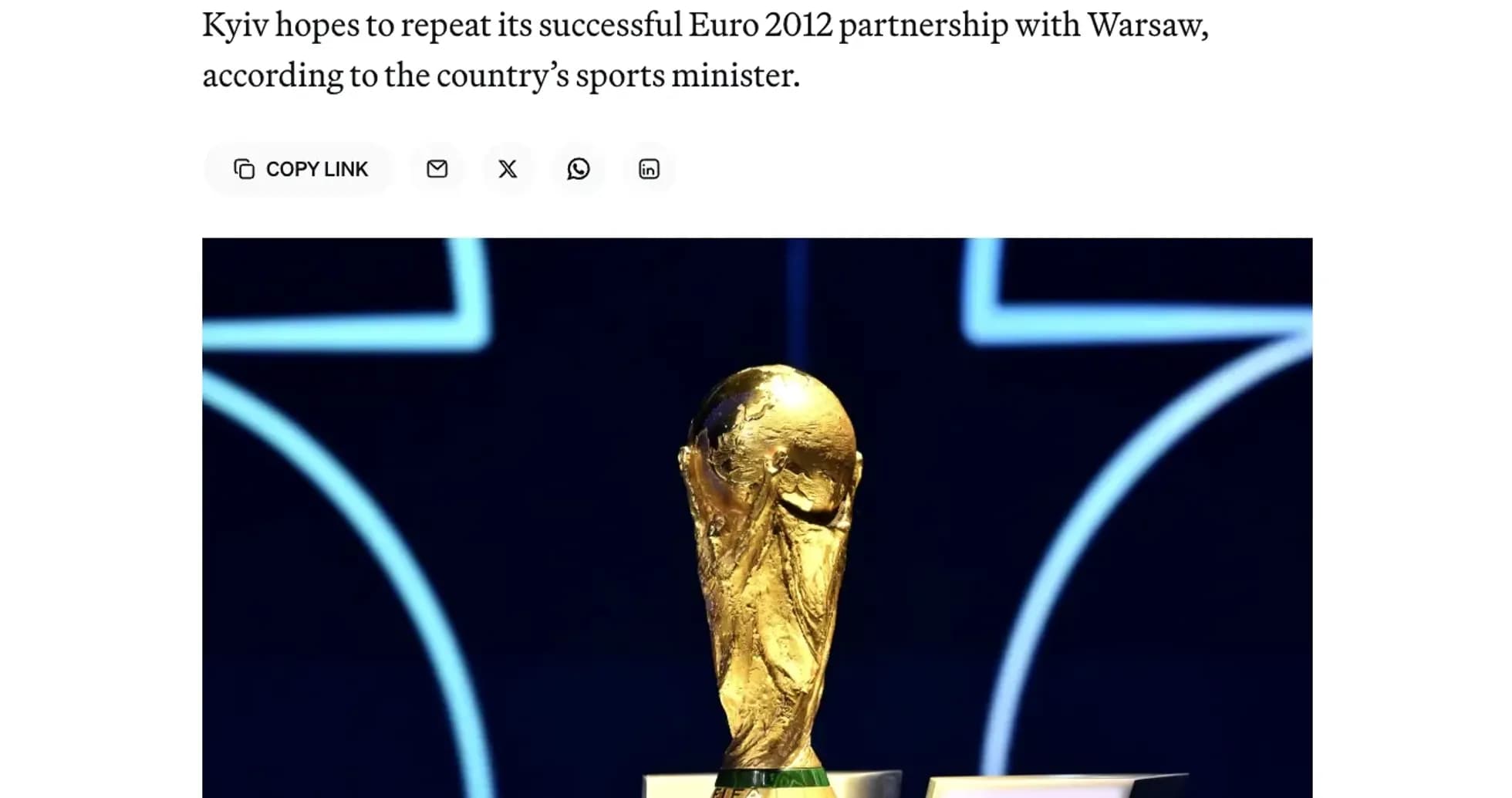 FIFA World Cup trophy displayed on a podium